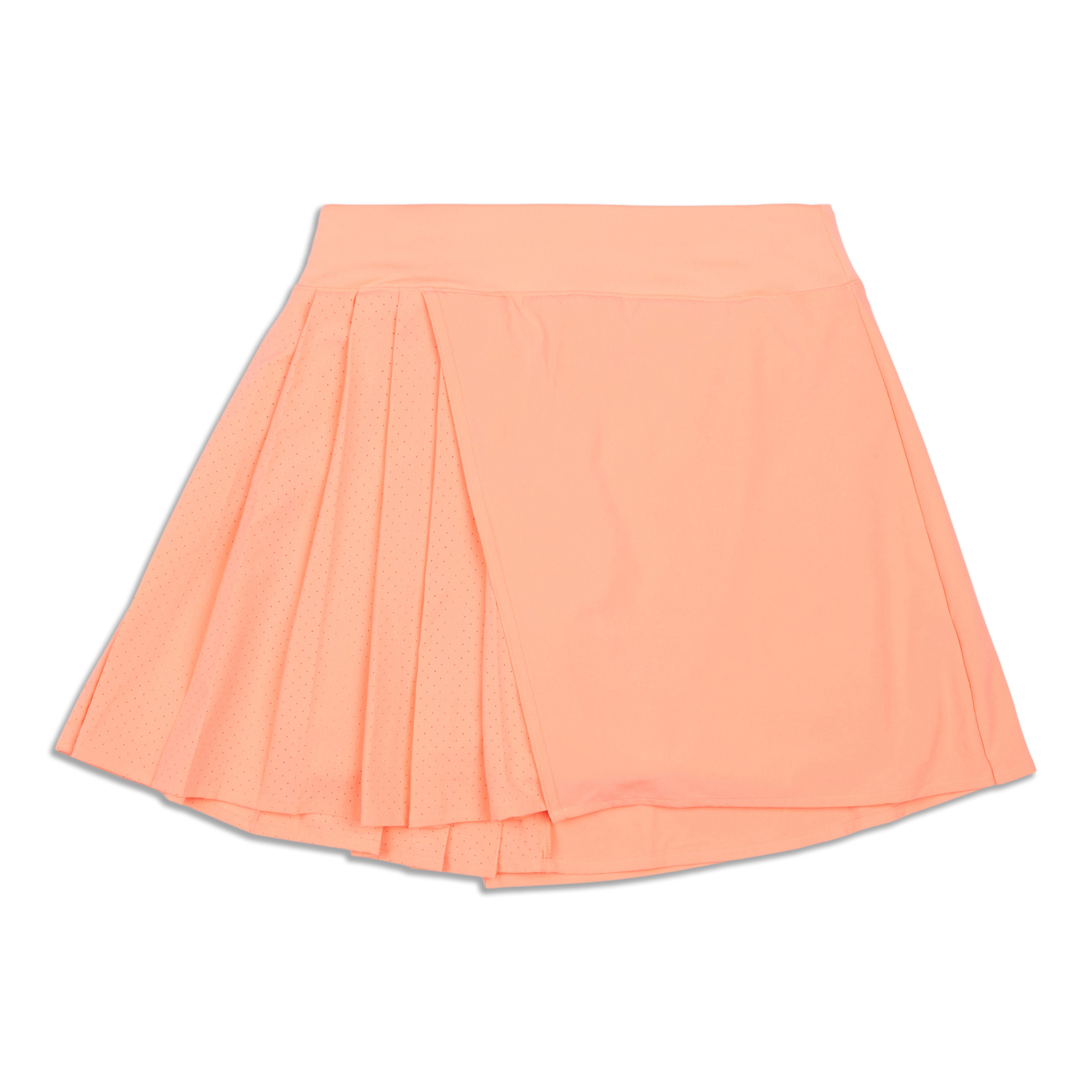 Orange pleated tennis skirt best sale